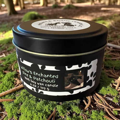 Candle in a tin with a label on a natural background
